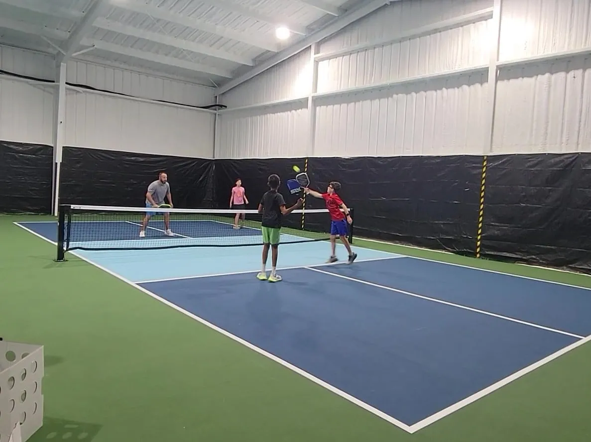 Doubles players at the net
